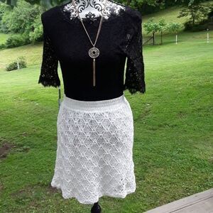 Stunning Cynthia Steffe med white lacy skirt.